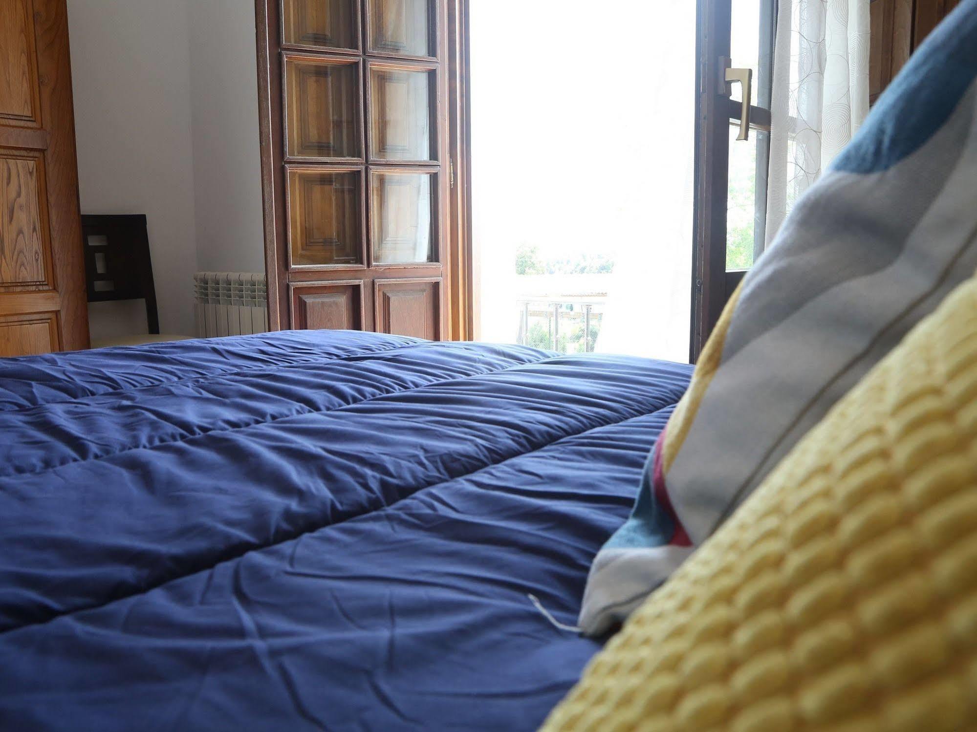 อปาร์ตาเมนโตส เอล การ์เดโอ Apartment La Revilla  ภายนอก รูปภาพ